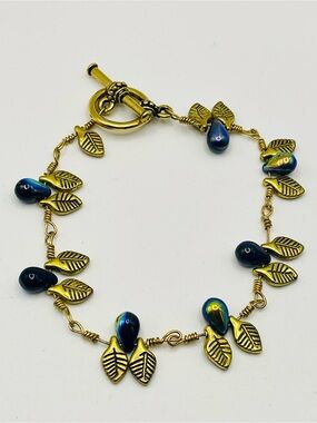 Gold Leaf Toggle Closure Bracelet with Iridescent Blue Teardrop Beads. Size 8